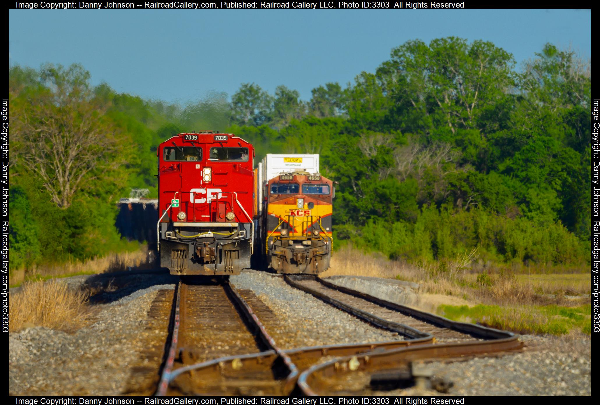CP 7039 is a class EMD SD70ACU and  is pictured in Delta, Louisiana, USA.  This was taken along the Vicksburg Subdivision on the Kansas City Southern Railway. Photo Copyright: Danny Johnson uploaded to Railroad Gallery on 04/17/2024. This photograph of CP 7039 was taken on Saturday, April 13, 2024. All Rights Reserved. 